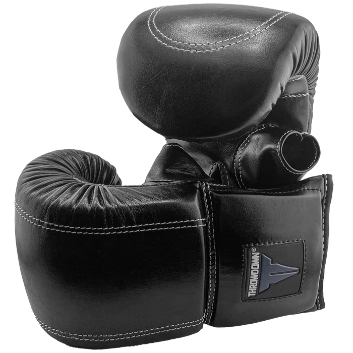 Black Throwdown Origin Glove | Classic Design | One Glove Leaning Against Another | Boxing Gloves | Punching Gloves | MMA Gloves | Elastic Strap | Training Gloves