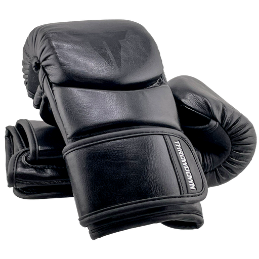 Throwdown Black Hybrid Glove | Wrist Strap | One glove leaning on another | Boxing Gloves | Punching Gloves | MMA Gloves | Velcro Strap | Training Gloves